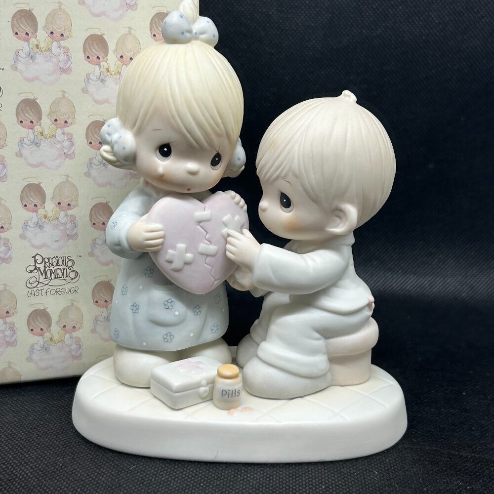 Precious Moments "He's the healer of broken hearts" figurine